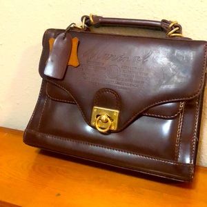 1 brown leather handbag